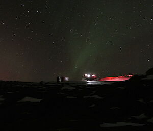 Ground near huts glows red like fire