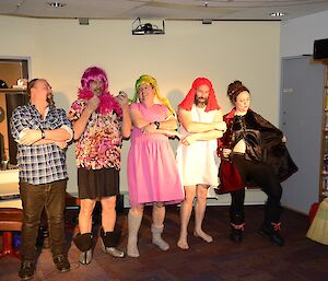 Men and one woman dressed up as the opposite sex for the play Cinderella.