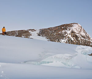 Angus coming down a snow slope when returning from servicing automated cameras..