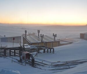 The site services pipework which provides heating, water and sewerage services to the station being buried by snow.