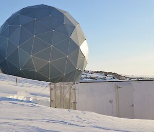 The container is where the potatoes are stored and is watched over by our satellite dome.