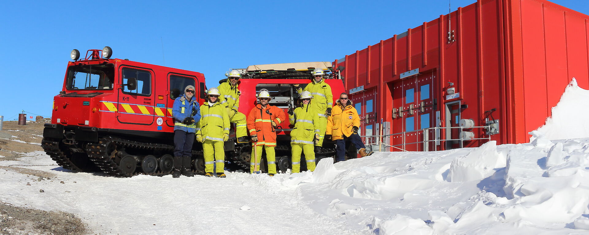 Emergency Response Team 1 in front of the fire Hägglunds.