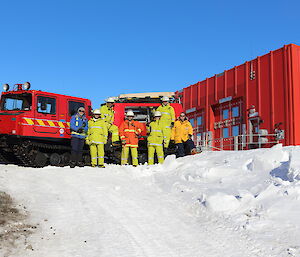 Emergency Response Team 1 in front of the fire Hägglunds.