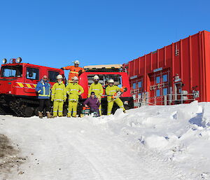 Emergency Response Team 2 in front of the fire Hägglunds.