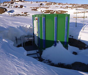 Wind scour around building leave entry to the building accessible.