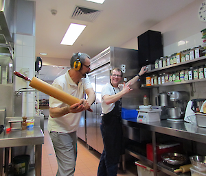 Angus turning the music up and I discussing the correlation between music volume and fine baking with the use of a rolling pin as a weapon..