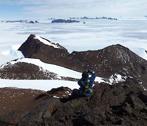 Peter photographing the views across the range and out over the ice plateau.