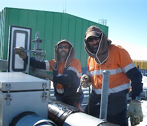 Site services repair by Charlie and Evan.