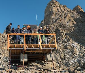 Two field parties meet at Rumdoodle hut veranda.