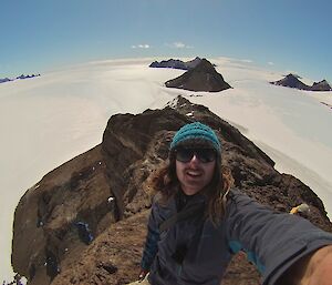 A selfie by James loving life on top of Phillips Ridge with the ice plateau stretching out behind him.