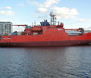 The Aurora Australis docked at Hobart with buildings behind