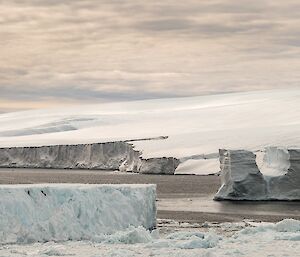 Cloudy skies and still winds make for some great ice drama as the ice.