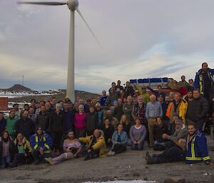 A group of 75 people standing next to two Hägglunds