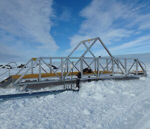 A large steel bridge in snow