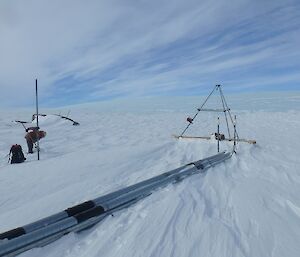 a steel triangle shaped support structure in snow