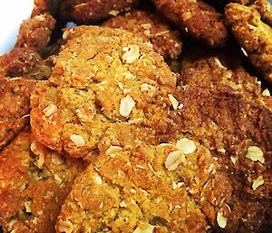 Close up of a pile of biscuits or cookies, made from oats