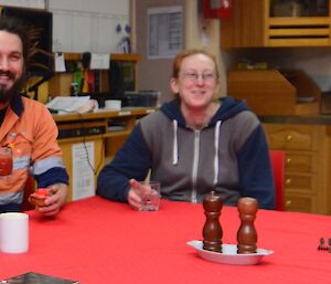 four expeditioners sitting at the table