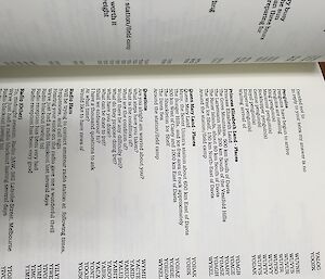 A page of a book with sentences and codes