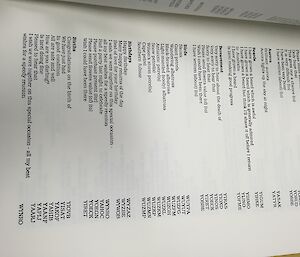a page of a book with sentences and corresponding codes