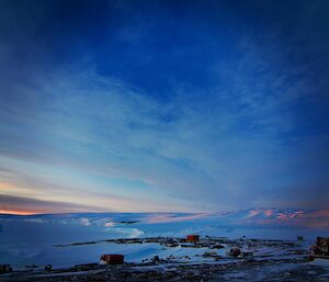 a sunrise reflecting of the glacier