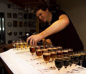 tasting glasses of wine being poured
