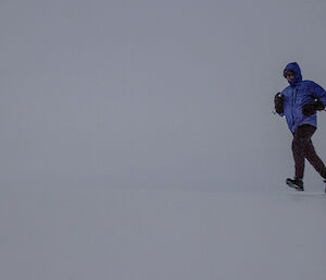 A man running in the snow