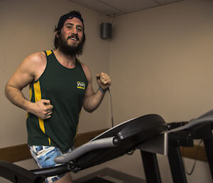 a man jogging on a treadmill
