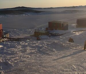 4x quads driving up a snowy hill