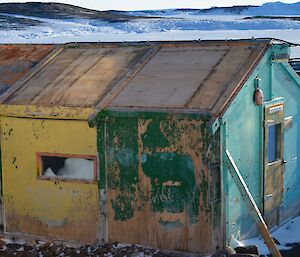 An old hut made out of wooden panels