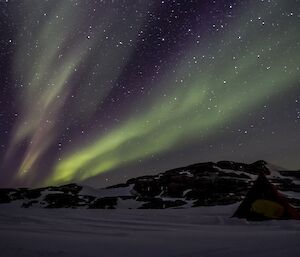 An aurora above a polar pyramid