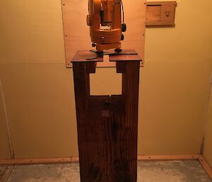 A magnetometer mounted on a large block of wood
