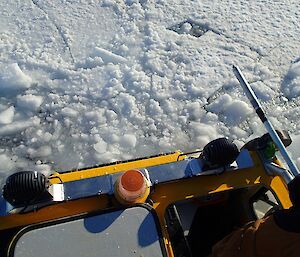 the sea ice cracking up in front of the hagglund