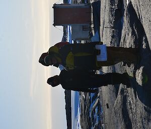 Three people looking at a map