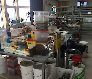 a table full of ingredients and cooking utensils ready to be put away again.