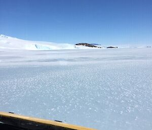 sea ice with ice cliffs on one side