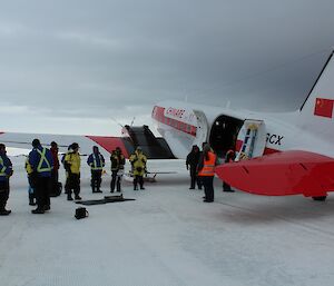 Expeditioners on the sea ice at Davis SLA preparing to board the Xueying bound for Mawson