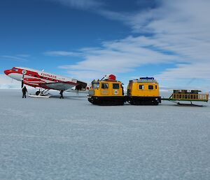 The Xueying on the sea ice at Mawson — preparing to collect luggage and cargo in the yellow Hagg