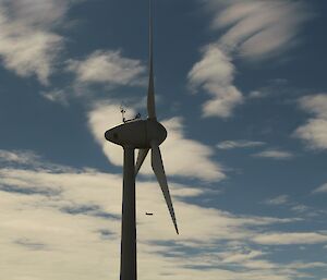 GCX dwarfed by the huge wind turbine at Mawson