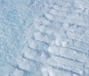 The dozer track showing the chopped ice tread marks