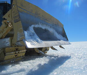 Tines on the dozer blade also used to chop up the track