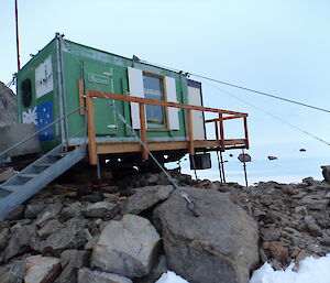 Rumdoodle Hut stitting on rocks in the North Masson Range