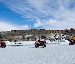 Arrival at the huts on Bechervaise Island on quads — from the left Andrew Cook, Shane Ness, Brett Sambrooks