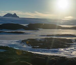 Looking south at the ice plateau with Framnes Mountains in the background