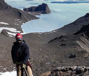 An expeditioner heading down Rumdoodle Peak in the Central Masson Range near Mawson Station