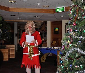 Santa’s helper, Andrew Cook dressed as a lovely lass reading out ‘Twas Christmas Night at Mawson'