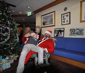 Shane gets his gift from Santa at Mawson 2016