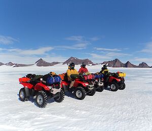 Four quads on the plateau for field travel training at Mawson 2016