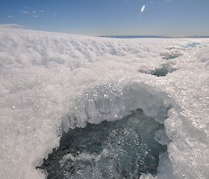 A melt stream on the plateau surrounded by ice