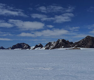 The Davis Range in the background with snow in front