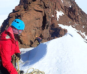 Heidi belaying Chris Hill up the final snow/ice section of Mt Hordern